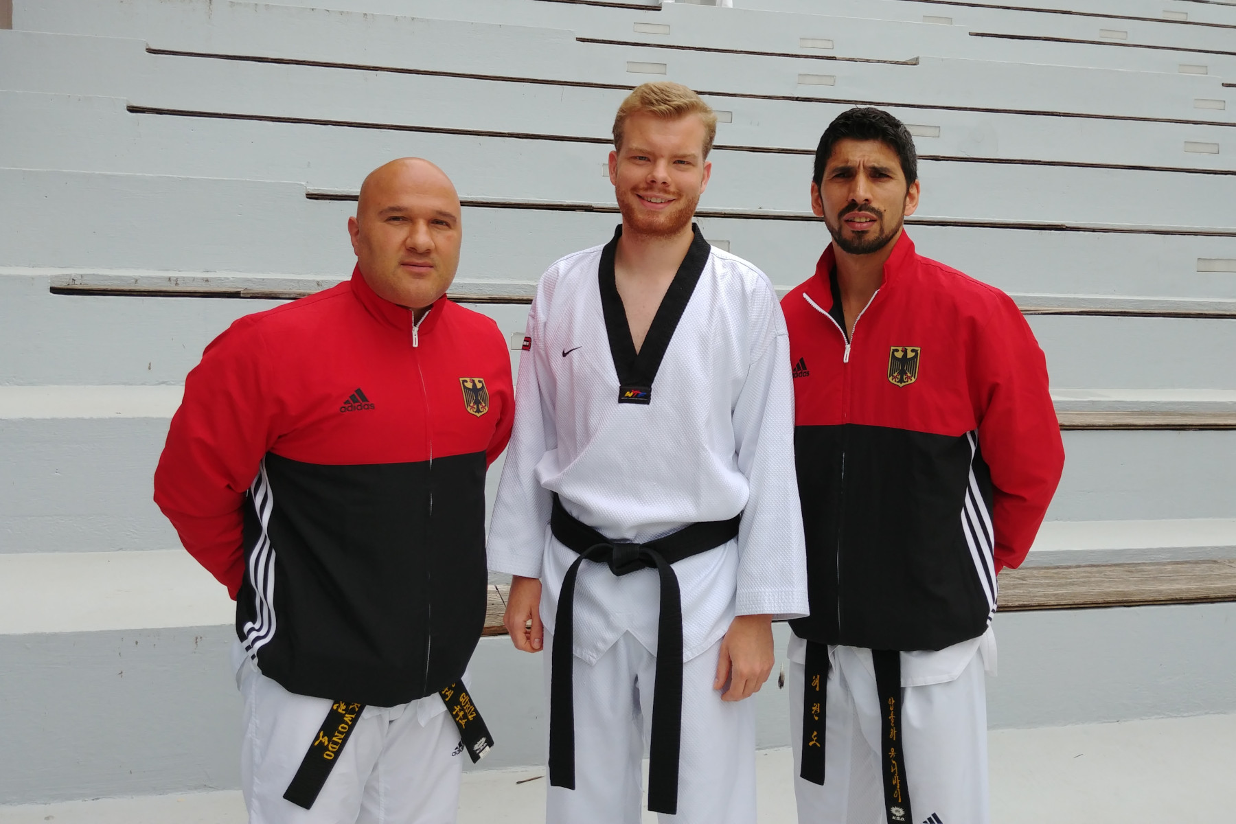 Savas Gürüz, TVSH-Kampfrichterreferent, und Paul Heinrich, Jugendleiter, mit dem DTU-Kampfrichterreferent, Abdullah Ünlübay
